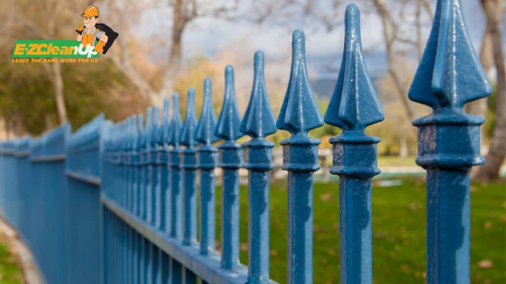 blue wrought iron fence