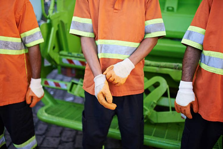 Cropped shot of a garbage collection team