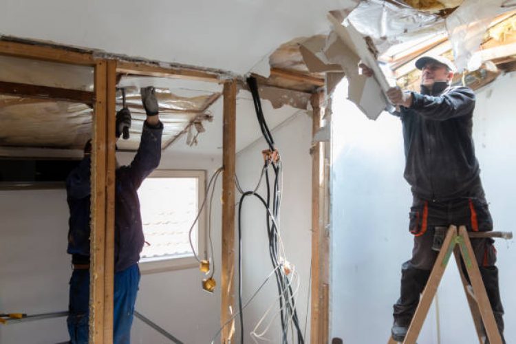 Preparation for renovation in the apartment.
Home renovation workers crew. Builders apartment improvement or restoration works.